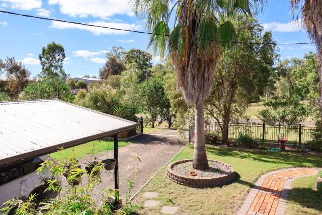 Family Home on a Spacious 2023sqm Block surrounded by mature, tranquil gardens