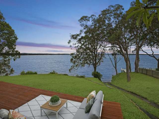 Absolute waterfront home plus studio on 1,126sqm block