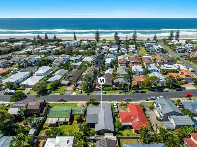 Downtown perfection just metres to the sand and surf