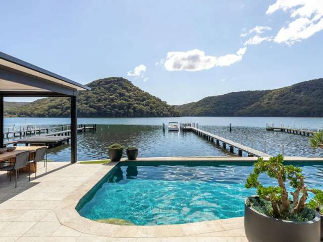 Prestige absolute waterfront home with private jetty and salt water pool