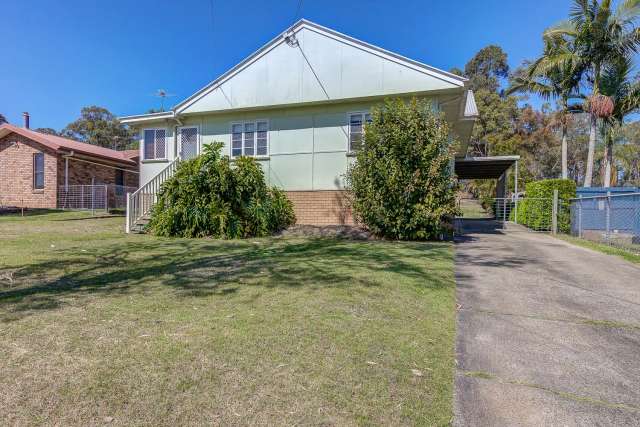 RARE FIND IN KINGSTON - 1350m2 block with a double bay shed!