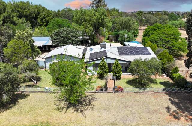 Entertainers Delight on a Spacious 1.2 Acres