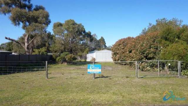 FULLY FENCED WITH LARGE GARAGE!