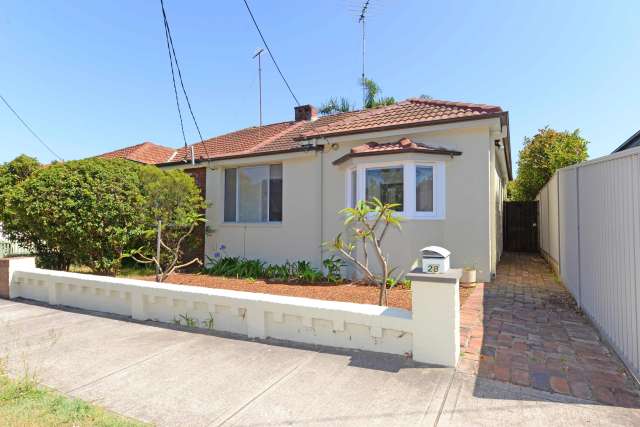 Double fronted house in quiet tree lined street