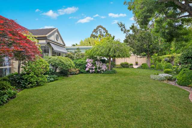 A Private Oasis on Park-like Grounds