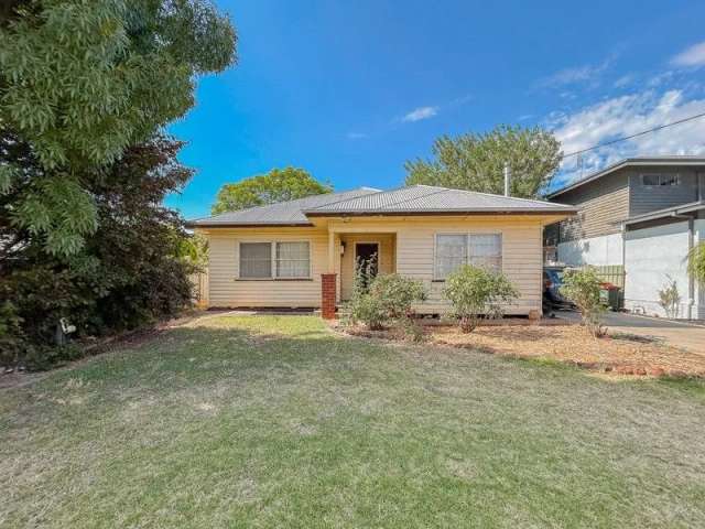 AFFORDABLE WEATHERBOARD HOME