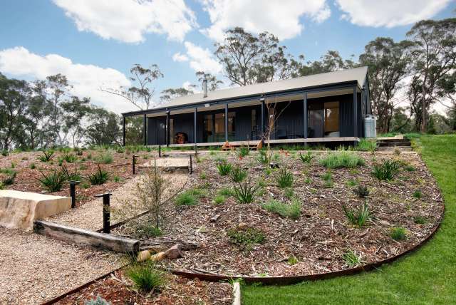 CONTEMPORARY MOUNTAIN ESCAPE SITUATED ON IDYLLIC ACREAGE