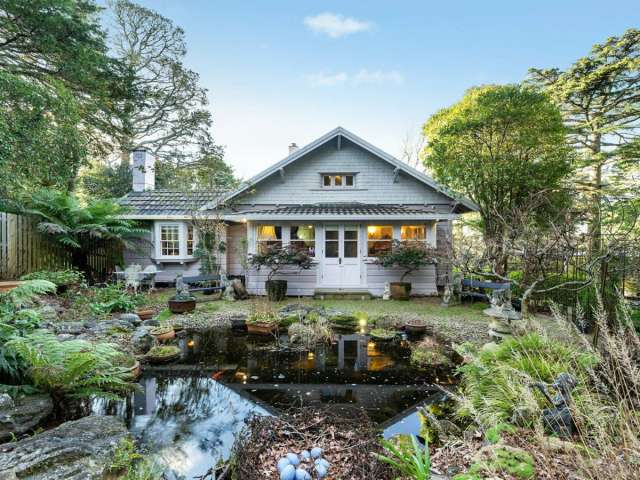 A charming weatherboard residence situated on an expansive garden block