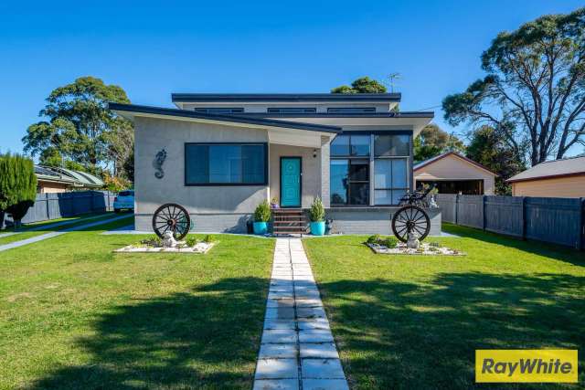 This brilliantly located home has been fully renovated inside and out.